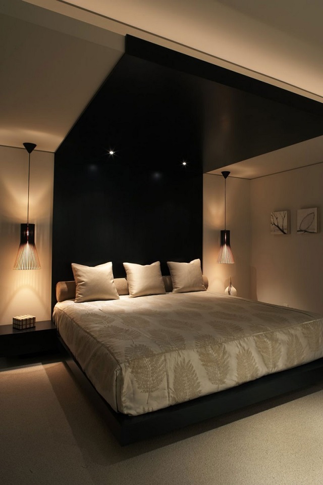 Bedroom with black theme and king size bed